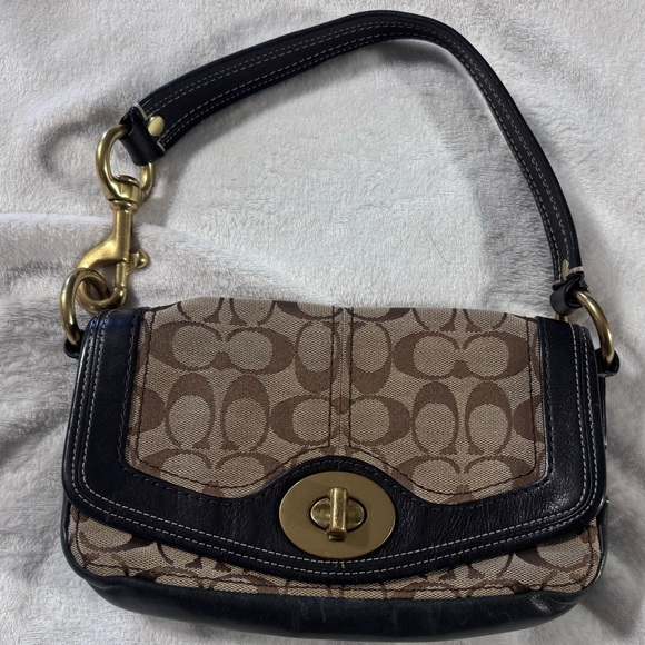 Coach Handbags - Coach Tan and Black Signature Shoulder Bag
